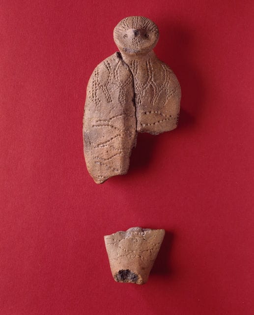 Stone age human clay figurine